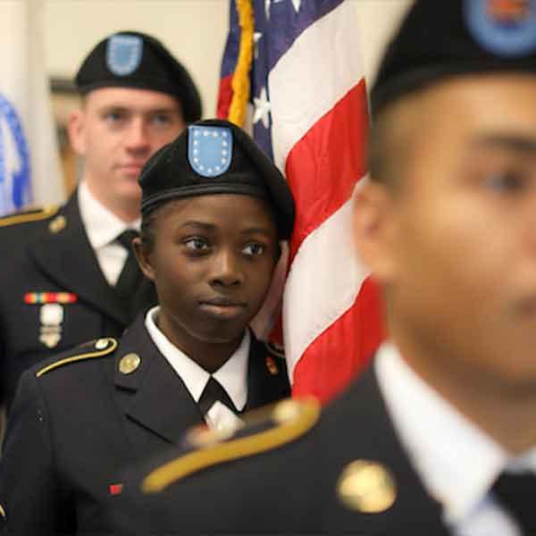 military student with flag